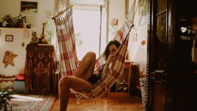 woman sitting on hammock