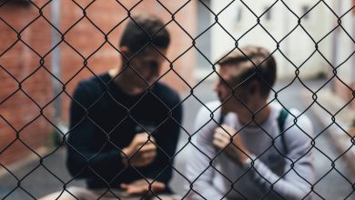 two men staring at each other