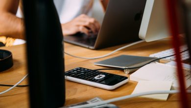 person using silver MacBook