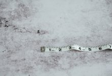 white measuring tape on white surface