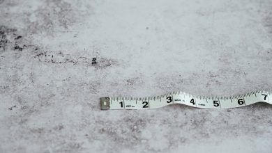white measuring tape on white surface