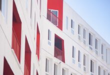 white and red concrete building atime