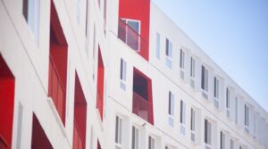 white and red concrete building atime