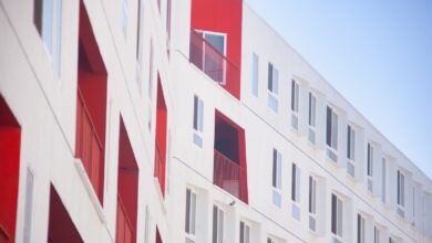 white and red concrete building atime