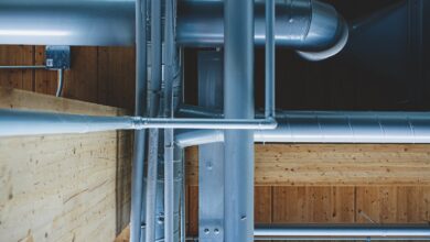 white metal railings near white concrete building during daytime