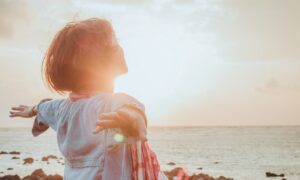 woman spreading her arms