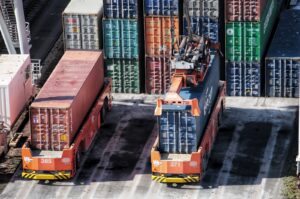 cargo containers are stacked on top of each other