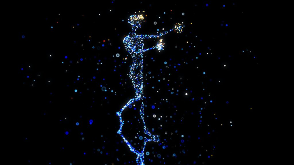 a person standing in the air with a star in their hand