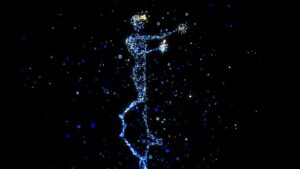 a person standing in the air with a star in their hand
