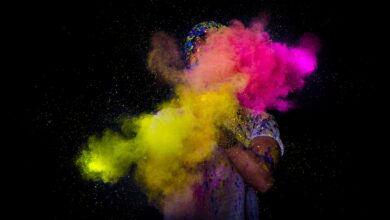 person throwing colored powder