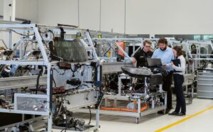 man in black jacket sitting on black chair