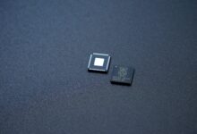 a couple of microchips sitting on top of a table