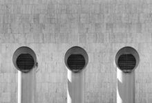 grayscale photo of round metal frame