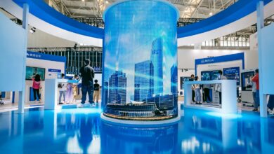 people standing in front of blue and white building