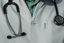 person in white and black stethoscope