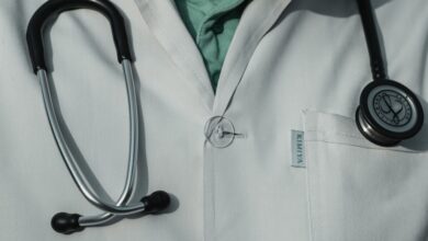 person in white and black stethoscope