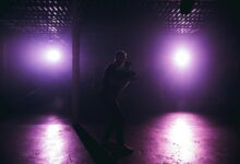 man holding video camera