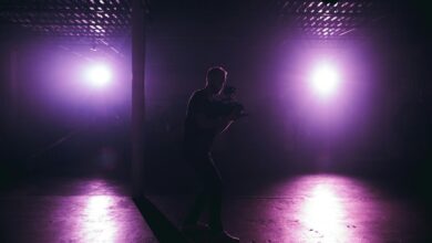 man holding video camera