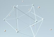 a white antenna with many small balls