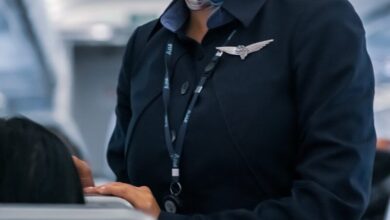 man in black suit jacket wearing mask