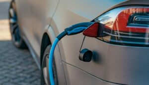 red and black car on road during daytime