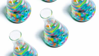 clear glass jar with multi colored heart shaped candies