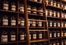 brown wooden shelf with bottles