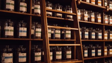 brown wooden shelf with bottles