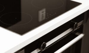 A black and white photo of a stove top oven