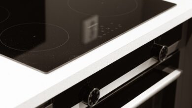 A black and white photo of a stove top oven