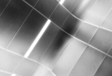 A black and white photo of a ceiling