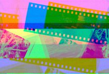 a multicolored film strip with a picture of a mountain in the background