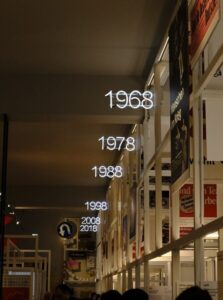 a group of people walking in a street