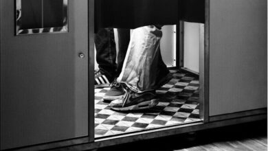 Person's legs inside a photo booth